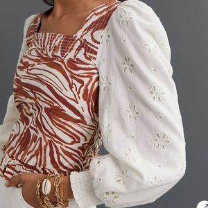 Anthropologie Love the Label puffed sleeve brown and cream animal print top